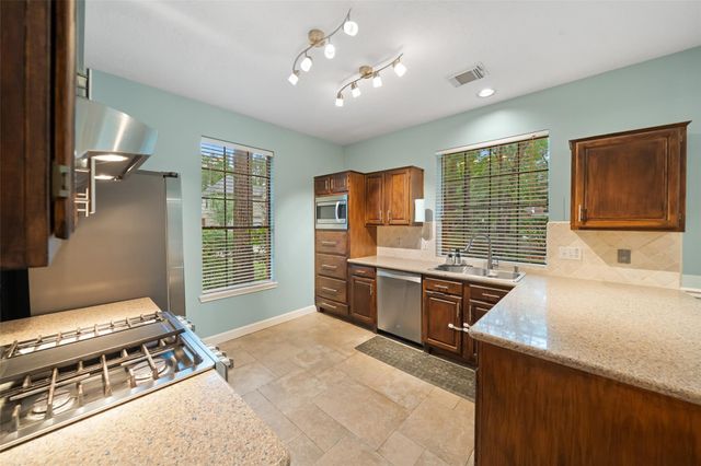84 E Stony End Place, The Woodlands, TX 77381