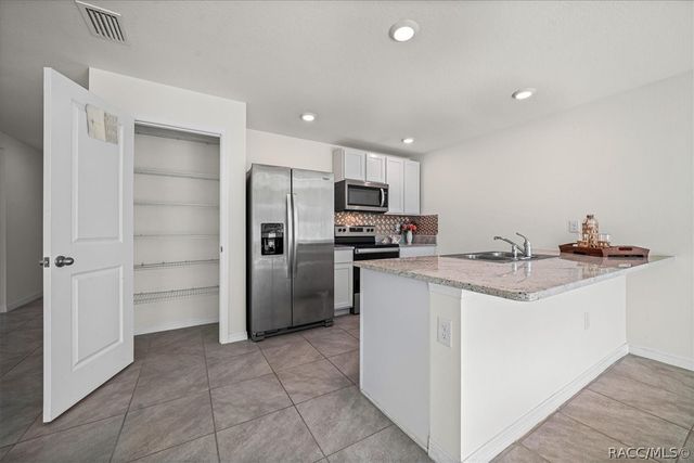 8471 Clearway Drive, Wildwood, FL 34785