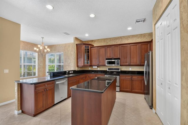 9377 Madewood Court, Royal Palm Beach, FL 33411
