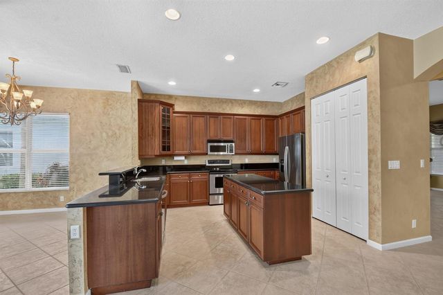 9377 Madewood Court, Royal Palm Beach, FL 33411