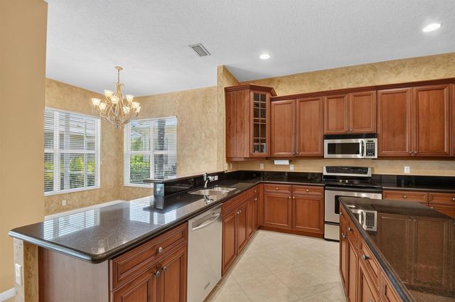 9377 Madewood Court, Royal Palm Beach, FL 33411