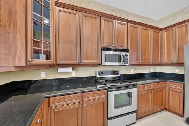 9377 Madewood Court, Royal Palm Beach, FL 33411