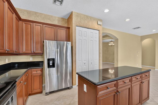 9377 Madewood Court, Royal Palm Beach, FL 33411
