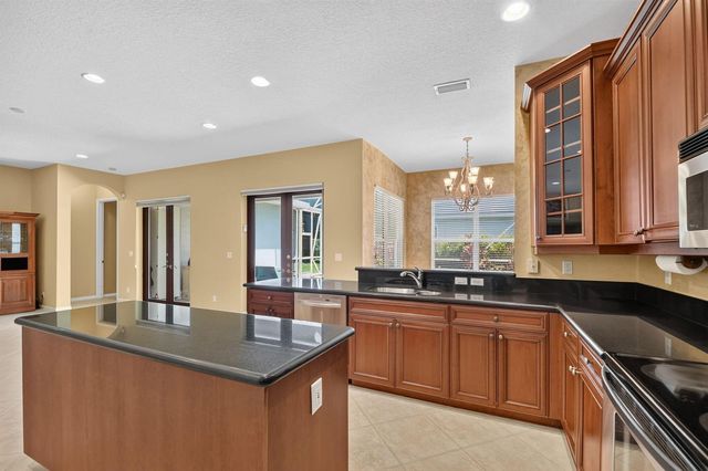 9377 Madewood Court, Royal Palm Beach, FL 33411