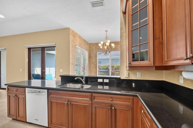 9377 Madewood Court, Royal Palm Beach, FL 33411