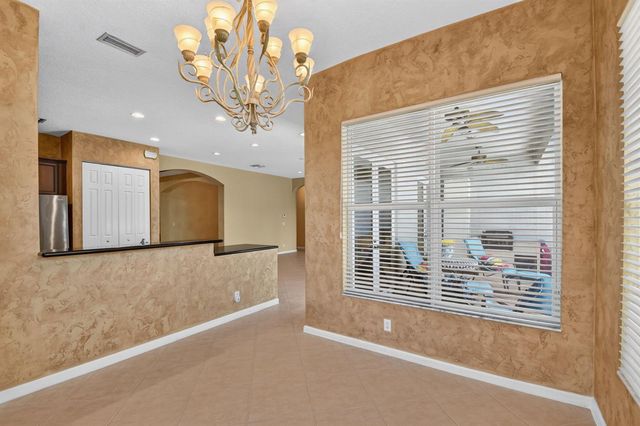 9377 Madewood Court, Royal Palm Beach, FL 33411