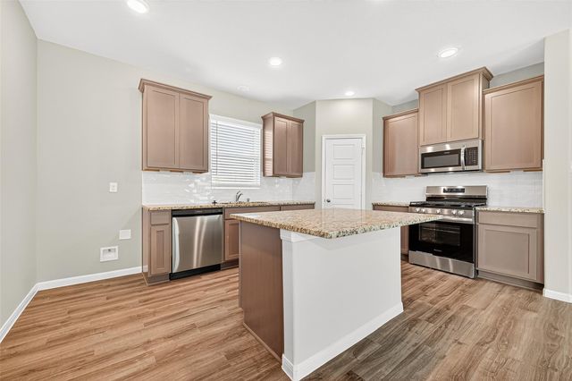 9975 Enclave Grove Drive, Willis, TX 77318