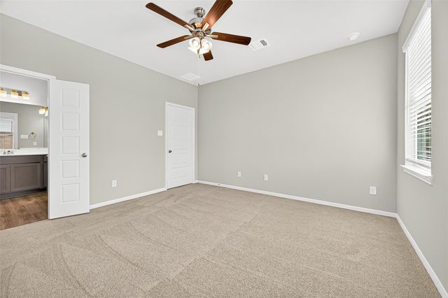 9975 Enclave Grove Drive, Willis, TX 77318