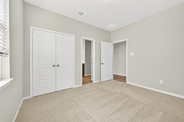 9975 Enclave Grove Drive, Willis, TX 77318