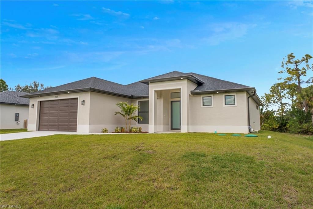 717 Theodore Vail ST E, LEHIGH ACRES, FL 33974 — exterior