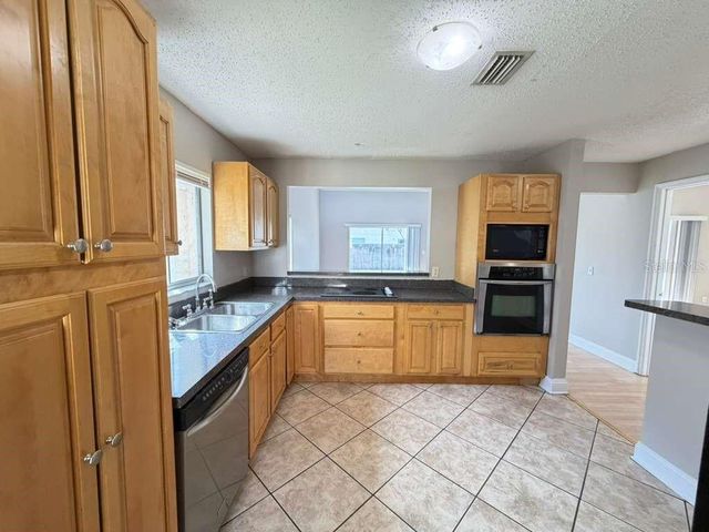 118 DAHLIA VILLAGE CIRCLE 79, Orlando, FL 32807