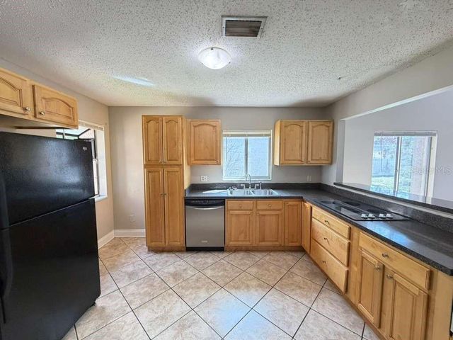 118 DAHLIA VILLAGE CIRCLE 79, Orlando, FL 32807