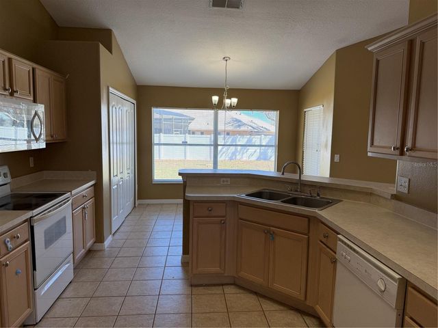 1048 PRINCETON DRIVE, Clermont, FL 34711