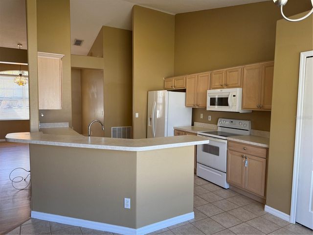 1048 PRINCETON DRIVE, Clermont, FL 34711