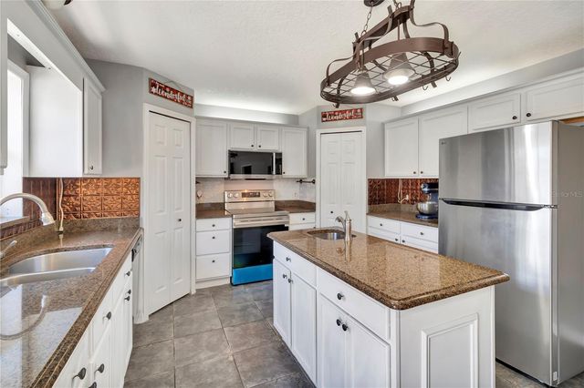 7642 PARK HILL AVENUE, Leesburg, FL 34748
