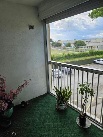 300 Village Green Circle S 302, Palm Springs, FL 33461