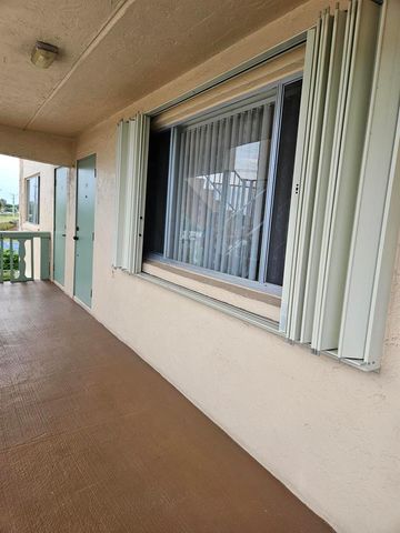 300 Village Green Circle S 302, Palm Springs, FL 33461