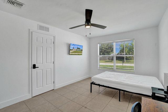 303 NE Solida Circle, Port St. Lucie, FL 34983