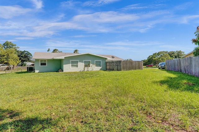 303 NE Solida Circle, Port St. Lucie, FL 34983