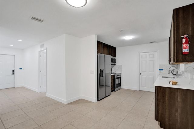 303 NE Solida Circle, Port St. Lucie, FL 34983