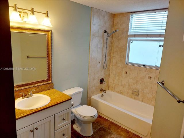 641 Lyons Road 11207, Coconut Creek, FL 33063