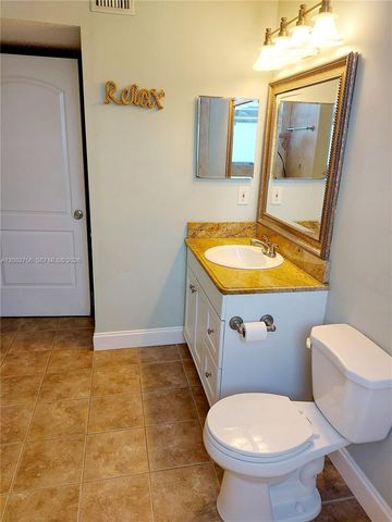 641 Lyons Road 11207, Coconut Creek, FL 33063