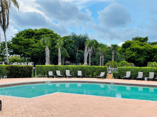 641 Lyons Road 11207, Coconut Creek, FL 33063