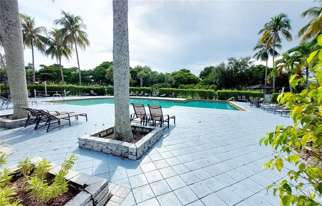 641 Lyons Road 11207, Coconut Creek, FL 33063