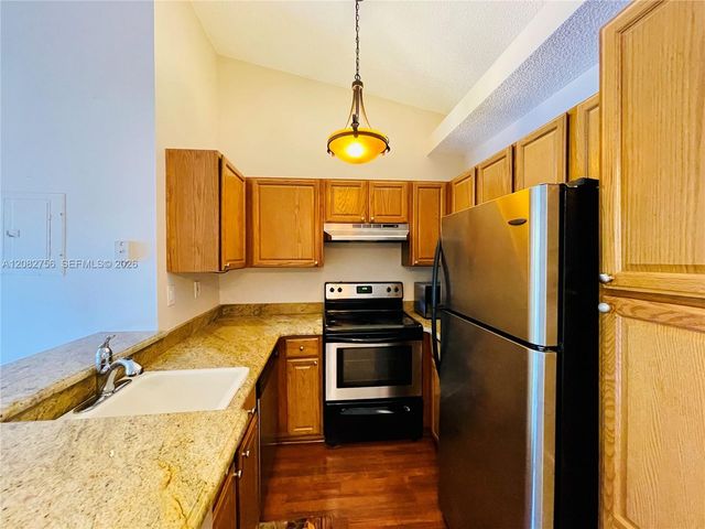641 Lyons Road 11207, Coconut Creek, FL 33063