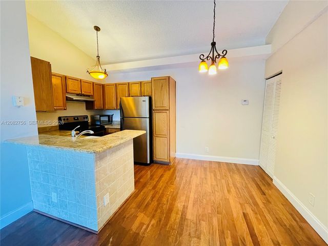 641 Lyons Road 11207, Coconut Creek, FL 33063