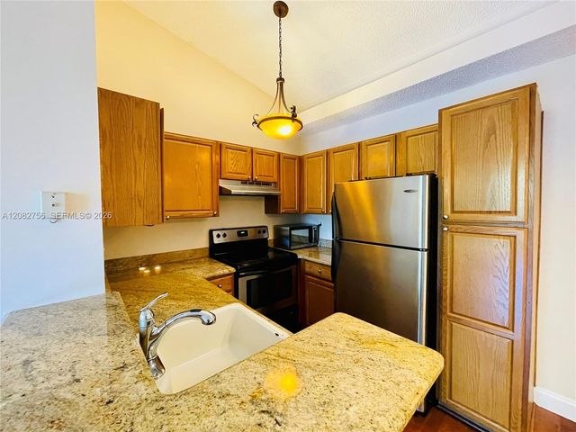 641 Lyons Road 11207, Coconut Creek, FL 33063