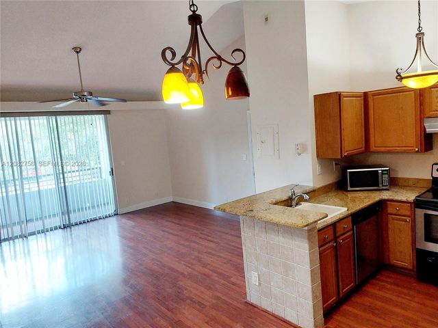 641 Lyons Road 11207, Coconut Creek, FL 33063