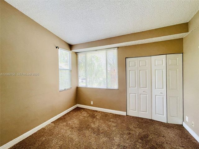 641 Lyons Road 11207, Coconut Creek, FL 33063