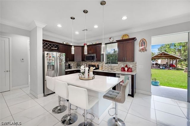 543 20th ST SE, Naples, FL 34117