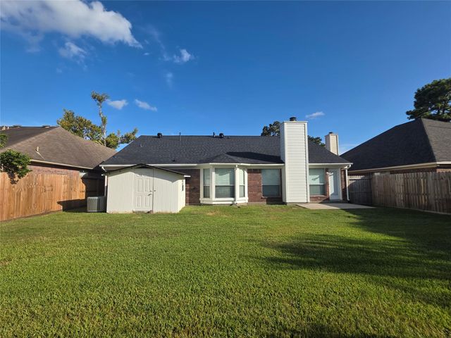 7127 Oak Walk Drive, Humble, TX 77346