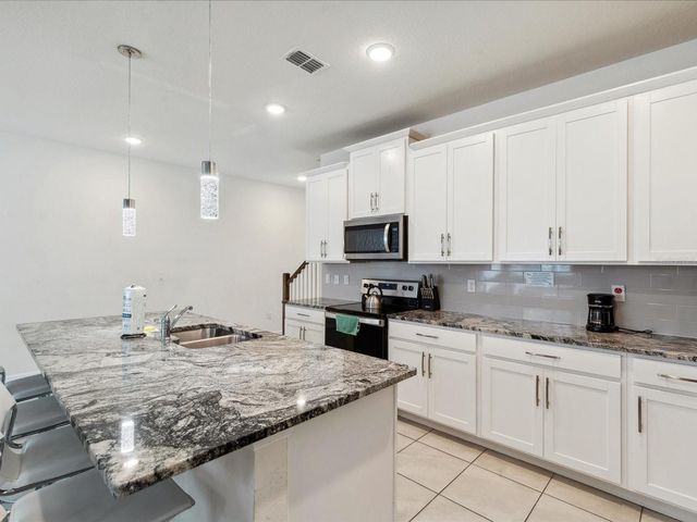 1632 TROPICAL PALMS CIRCLE, Kissimmee, FL 34747