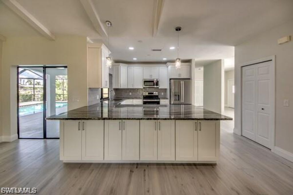 711 SE 33rd TER, CAPE CORAL, FL 33904 — photo 4
