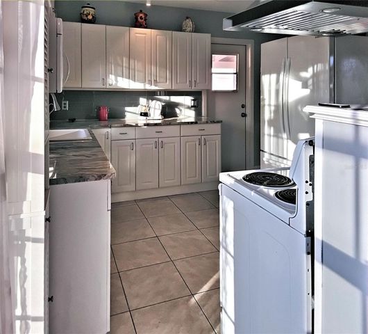 2440 ELKCAM BOULEVARD, Port Charlotte, FL 33952