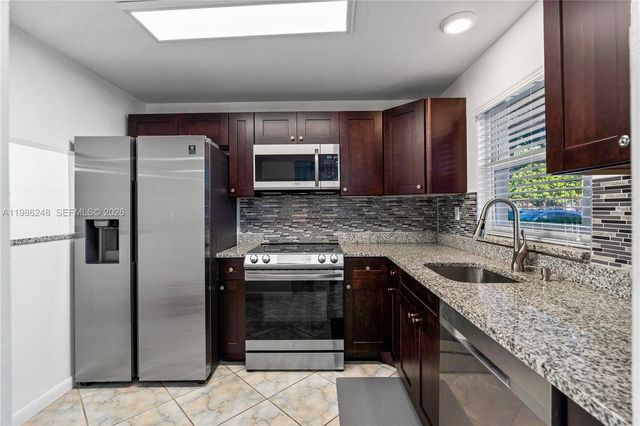 9540 Sunrise Lakes Boulevard 103, Sunrise, FL 33322