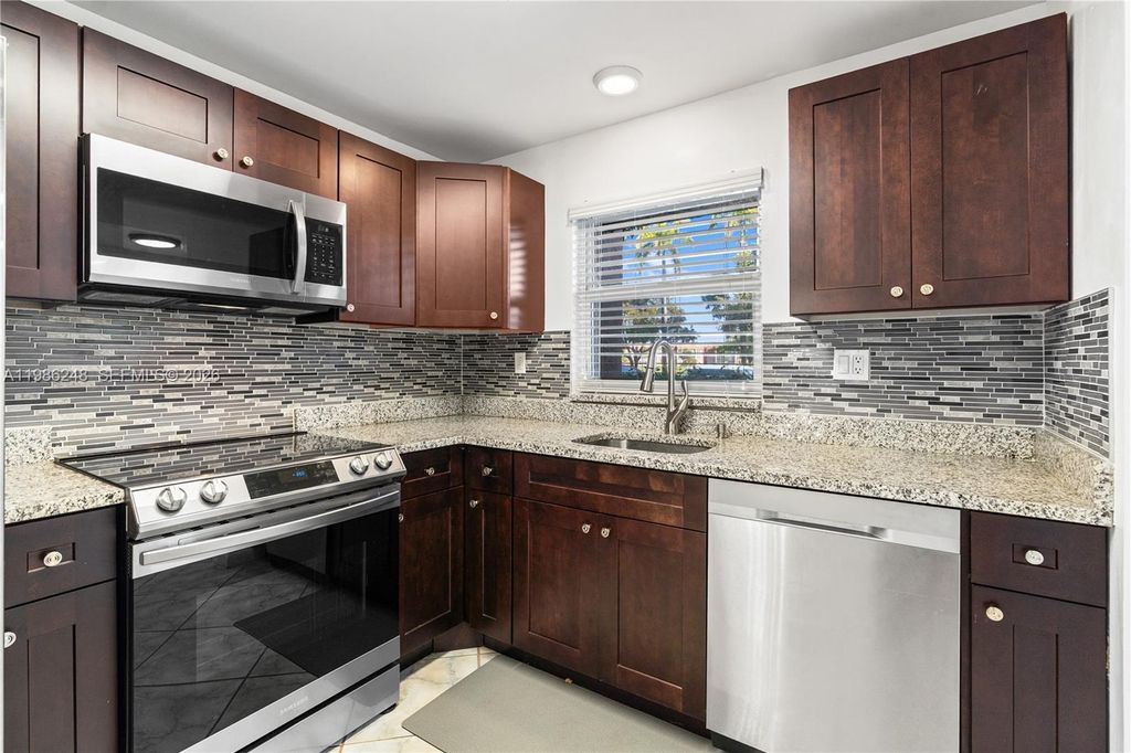 9540 Sunrise Lakes Boulevard 103, Sunrise, FL 33322