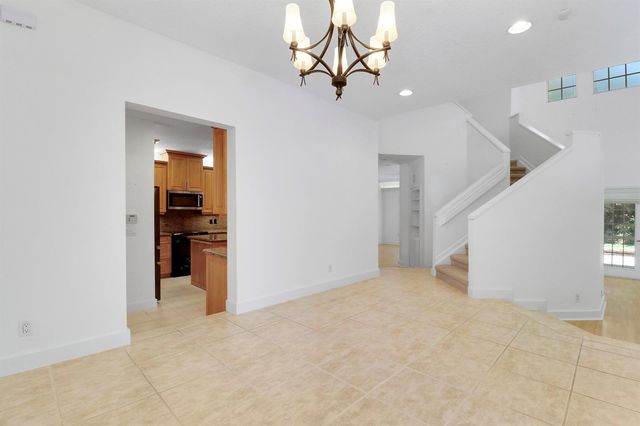 12 Grand Bay Circle, Juno Beach, FL 33408