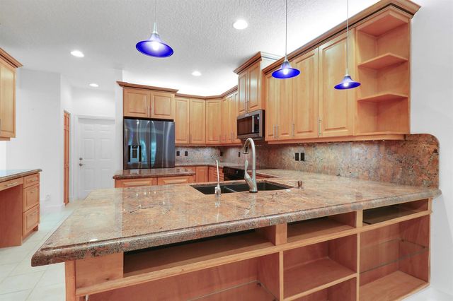 12 Grand Bay Circle, Juno Beach, FL 33408