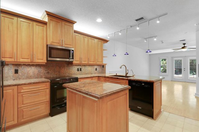 12 Grand Bay Circle, Juno Beach, FL 33408