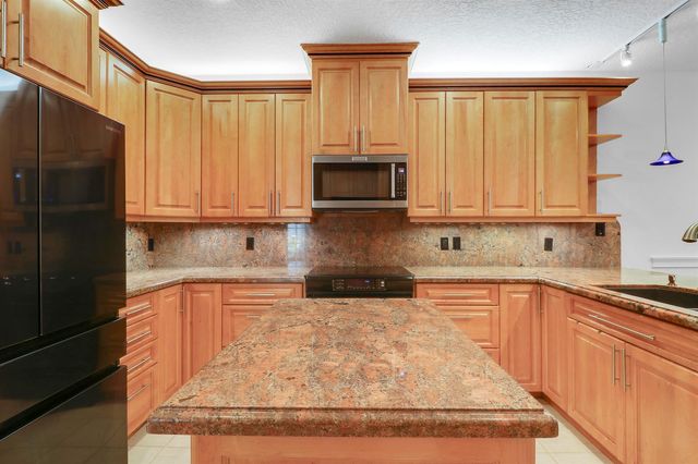 12 Grand Bay Circle, Juno Beach, FL 33408