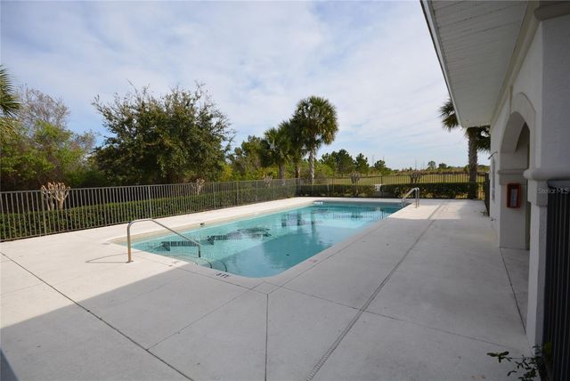 9441 MYRTLE CREEK LANE 215, Orlando, FL 32832