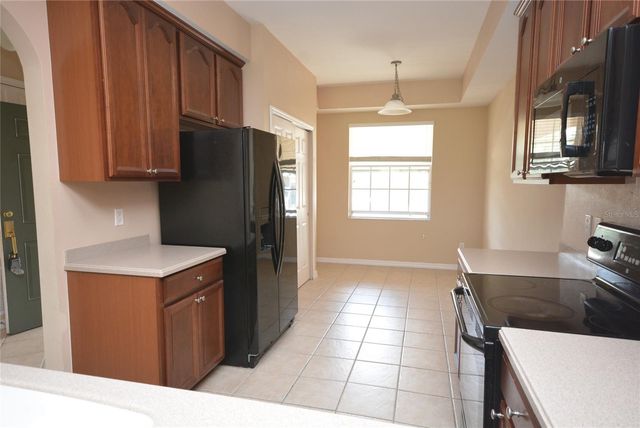 9441 MYRTLE CREEK LANE 215, Orlando, FL 32832