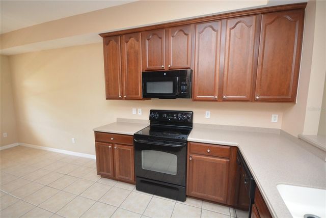 9441 MYRTLE CREEK LANE 215, Orlando, FL 32832