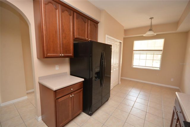 9441 MYRTLE CREEK LANE 215, Orlando, FL 32832