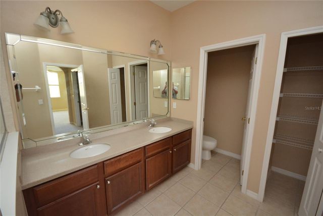 9441 MYRTLE CREEK LANE 215, Orlando, FL 32832