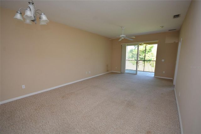 9441 MYRTLE CREEK LANE 215, Orlando, FL 32832